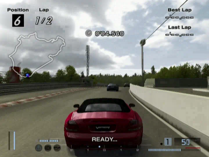 A red car on a Gran Turismo 4 race track in the PS2 Web Recomp maintainer’s browser demo